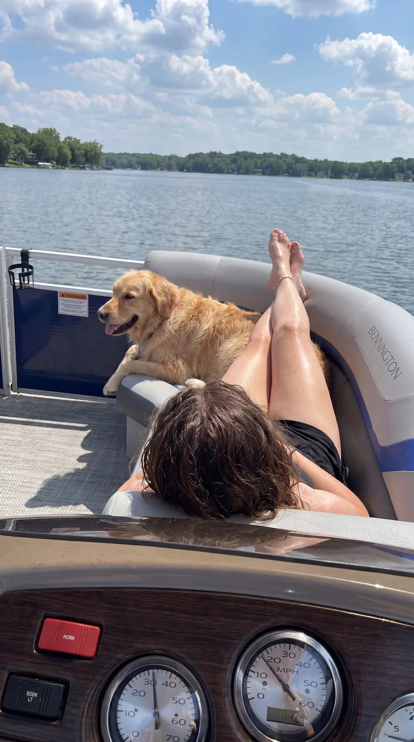 An owner and dog from the BARKLO family